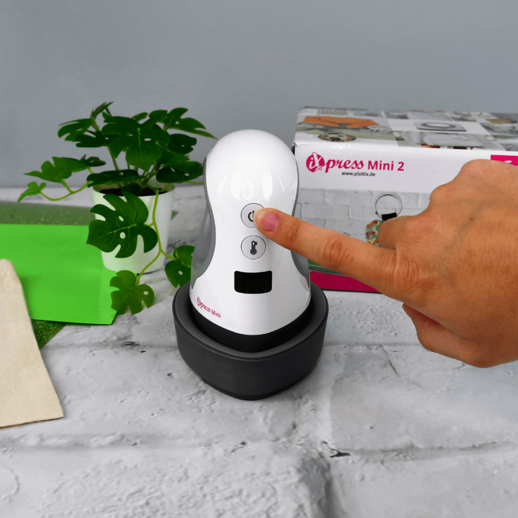 iXpress Mini 2 Transferpresse aus Ablage stellen und einschalten
